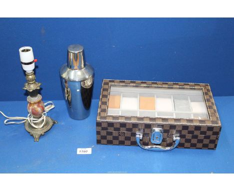 A Cocktail shaker, an onyx and metal lamp base and a designer watch Display Box.