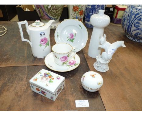 A selection of Meissen porcelain, including a coffee pot and a trio painted with roses, a Meissen snuff box, a similar circul