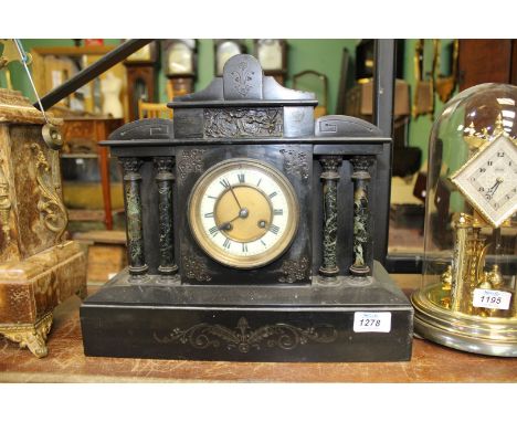 A two train slate Mantle Clock having Roman numerals with pendulum and key, 14" wide x 12 1/2" high.