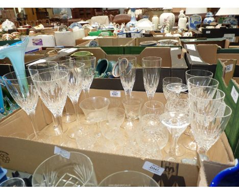 A selection of crystal glassware including set of six red wine glasses, four matching white wine glasses, three Galway brandy