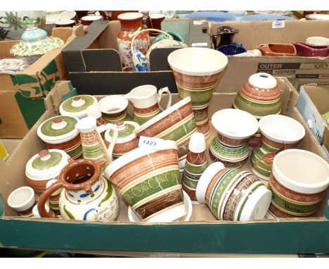 A good quantity of Dragon Pottery including cruets, preserve pots, planters and saucers, jug, vases etc.