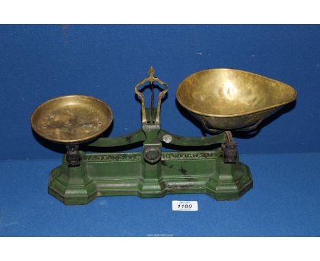 A pair of green and brass 'W.T. Avery' weighing scales.