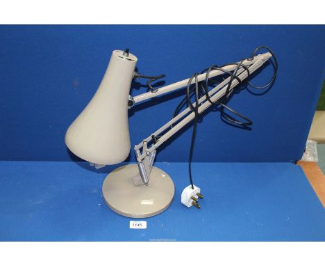 A mushroom brown coloured anglepoise lamp,