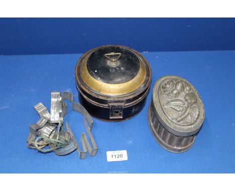 A Georgian metal spice box, Victorian ice cream mould and several vintage biscuit cutters.