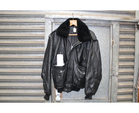 An original "Batman" leather flying jacket, Issued by Warner Bros. to the Cast and Crew making the film, plus Batman memorabi