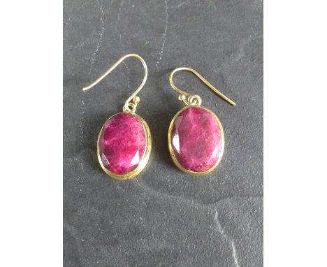 A pair of gilt metal and ruby/red stone earrings 2cm