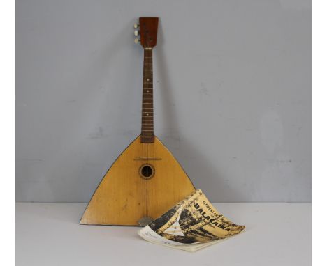 A Balalaika musical instrument 80cm together with Dorozhkin [Alexander] Elementary method for the Balalaika in four parts
