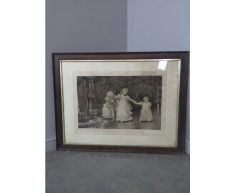 After Isaac Snowman (1874-1969) A Late Victorian/Edwardian print of children, signed in pencil to margin, within a moulded oa