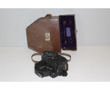 An Ensign Auto-Kinecam 'sixteen' 16mm Cine Camera, Type B No 3323 with Taylor Hobson Cinar lens, with original Ensign leather