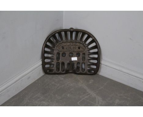 An American cast-iron 'Stoddard MFG CO' Dayton O' implement or tractor seat 39.5cm wide