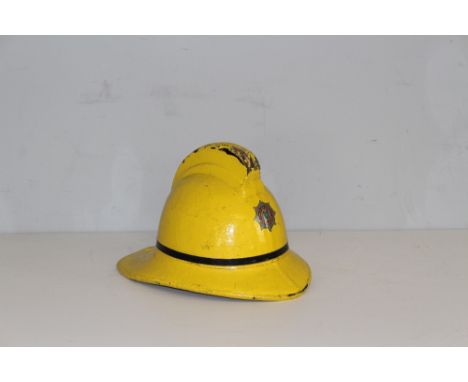 An Isle Of White Fire Brigade helmet, manufactured by Helmets Ltd, Wheathamstead, Herts, number 2320. used condition.