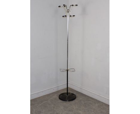 A mid-century Atomic style chrome and cast-iron hall stand , with black finial hooks and two umbrella divisions over the cast