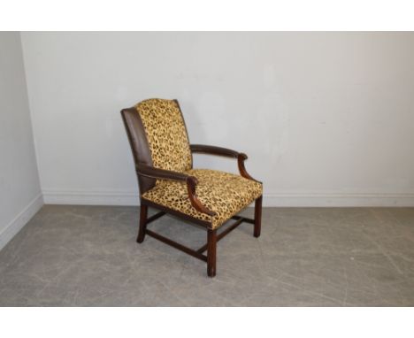 Leather &amp; Leopard Print Fabric Armchair, with scrolled partially padded arms, raised on butterfly moulded supports 97cm h