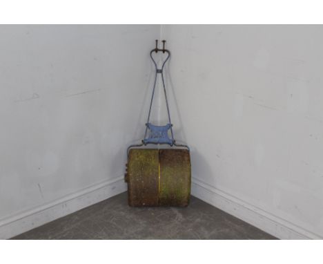 A vintage 'Dalecast' iron garden roller, 105cm high, drum width 36cm wooden handle depleted.