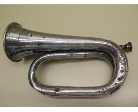 A silver plated Boosey and Hawkes bugle engraved Sheffield from the city to The ship 1946, HMS Sheffield was commissioned in 