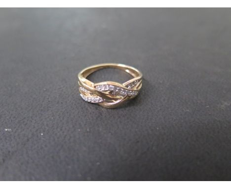 A 9ct yellow gold and diamond ring, marked 375, size K, approx 1.9 grams, some wear to shank but generally good 