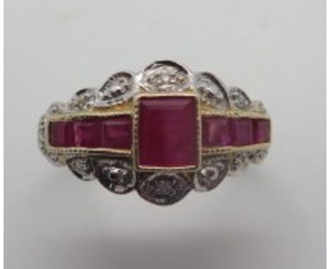 A 9ct yellow gold Art Deco style ruby and diamond ring, size L 1/2, hallmarked, approx 2.8 grams, central ruby approx 5 x 4m,