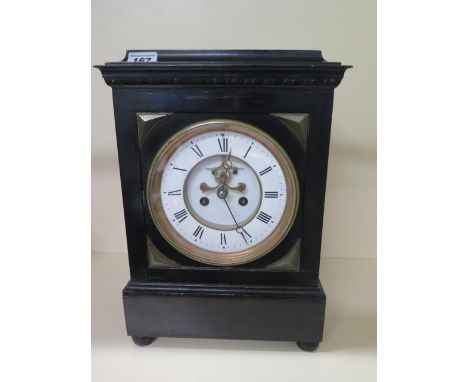 A French 8 day striking mantle clock with exposed escapement in an ebonised case, 37cm tall x 26cm wide, not currently runnin