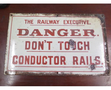 A railway enamel sign The Railway Executive Danger Don't Touch Conductor Rail, 32cm x 51cm, some chipping to sign 