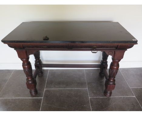 A Victorian slate marble top mahogany serving table with two frieze drawers, one stamped Gillows Lancaster, the other 22458, 