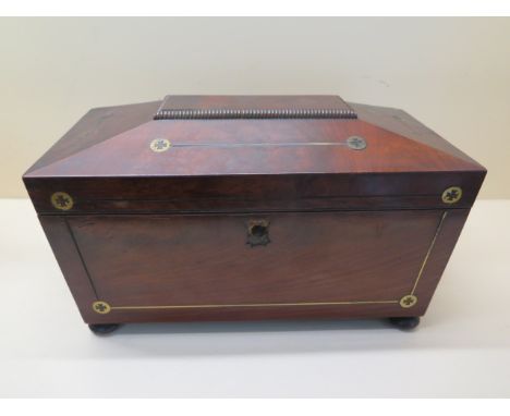 A 19th century mahogany two section tea caddy with brass inlay reasonably good, some veneer and brass loss, escuteon missing 