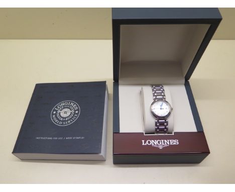 A ladies mid size Longines stainless steel Primaluna 2016 quartz bracelet wristwatch with mother of pearl dial and diamond ma