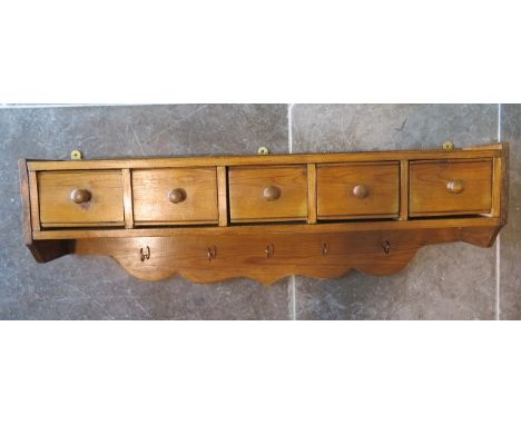 A vintage pine wall shelf with drawers, 87cm x 26cm x 16cm, in good polished condition 