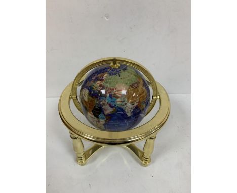 Blue stone globe in brass setting with compass to base 