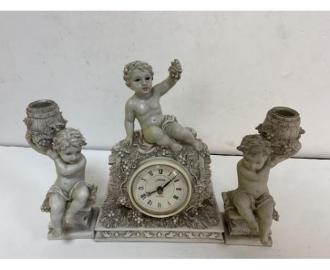 Juliana mantle clock with matching Putti candle-holders 