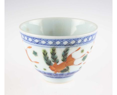 A CHINESE PORCELAIN TEA BOWL painted with goldfish amongst aquatic plants, between underglaze blue borders, bears underglaze 