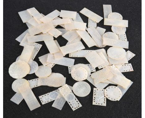 A COLLECTION OF 19TH CENTURY CHINESE MOTHER-OF-PEARL GAMING COUNTERS various sizes, with engraved decoration. (Approx. 85)