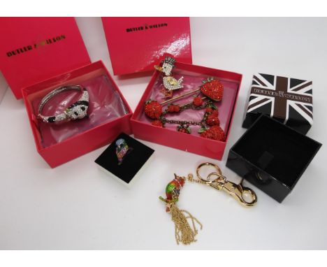 Butler &amp; Wilson, panda bangle, strawberry brooch, duck brooch, bird key ring, and an unsigned owl ring A condition report