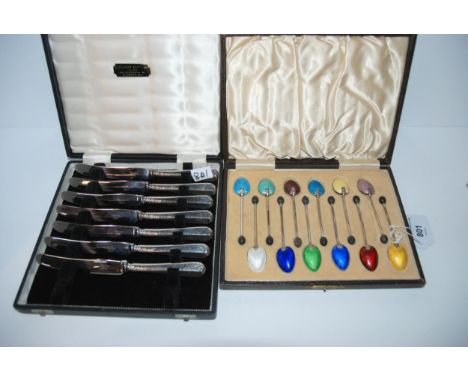 A lot comprising a cased set of twelve silver-gilt and enamel coffee bean spoons, Birmingham 1939 and a part set silver-handl