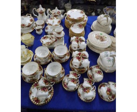 A Royal Albert Old Country Roses pattern tea, dinner and coffee service comprising cups and saucers, teapot, coffee pot, cake