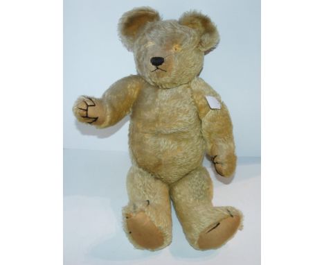 A vintage Teddy bear with growler, lacking eyes, 60cm long Condition report: Available upon request