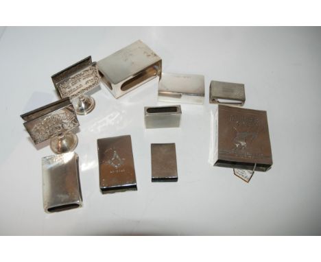 A lot comprising eight silver matchbox holders, including one marked Gauloises, one marked with a Masonic compass, 29.9,44, v