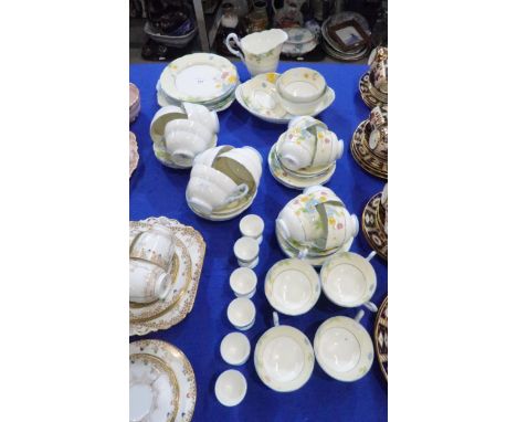 A Paragon floral decorated breakfast/ tea service, pattern number G2622, comprising six egg cups, six internally decorated cu