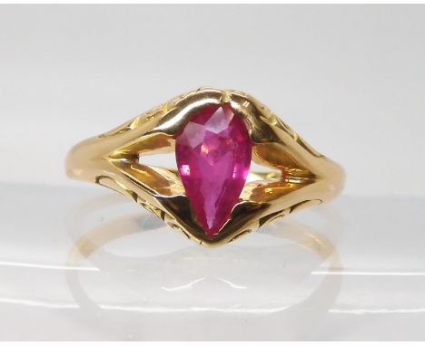A bright yellow ring set with a glass filled ruby, finger size T, weight 5gms Ruby nice but enhanced, mount pretty, has been 