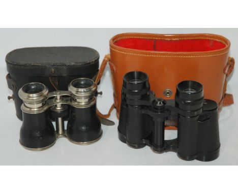 A pair of vintage binoculars and a modern pair Condition report: Available upon request