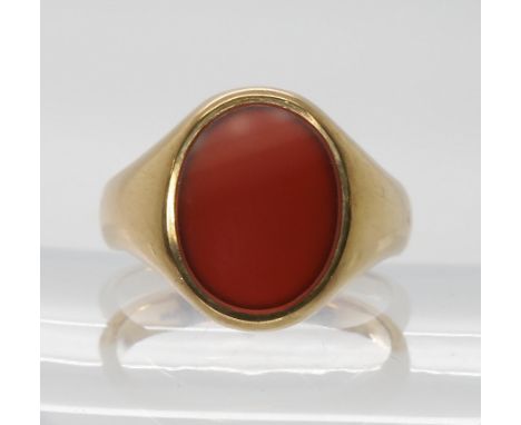 A 9ct gold carnelian signet ring, size V, weight 8.2gms Light general wear