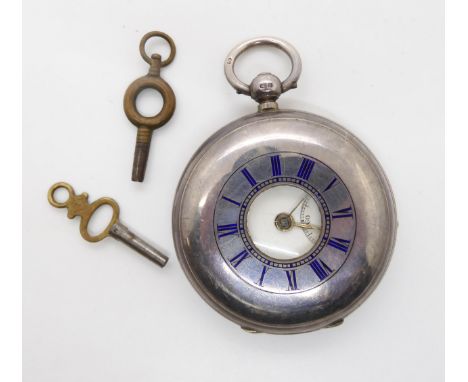 A silver half hunter pocket watch, London hallmarks for 1893, diameter 5cm Winds and is ticking enamel chapter ring good, por