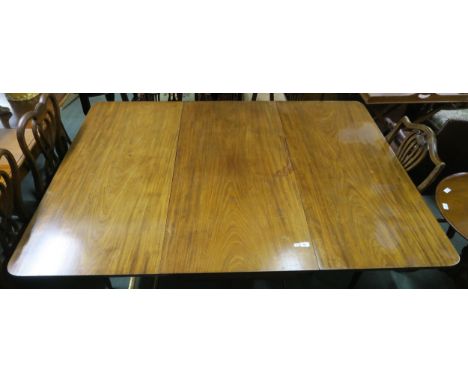 A Georgian mahogany drop end gate leg dining table on square tapering supports, 70cm high x 184cm long x 132cm deep Condition