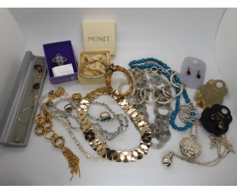 An Indian style peacock bangle items by Monet and Buckingham etc A condition report is not available for this lot.