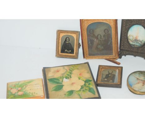 A portrait miniature of a lady, daguerreotypes etc Condition report: Available upon request