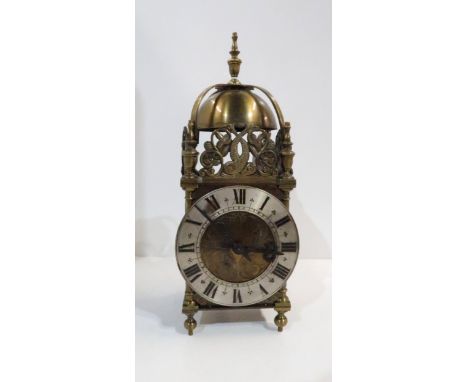 A brass lantern clock marked Rotherham, and with stamped number 16914 Condition report: Available upon request