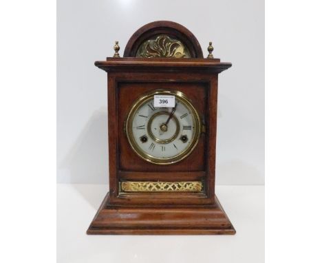 A mantle clock with inlaid brass frets Condition report: Available upon request