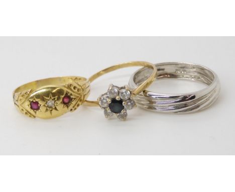 A bright yellow metal ruby and diamond ring (indistinct Chester hallmarks) size Q, weight 2.2gms, a sapphire and cz flower cl