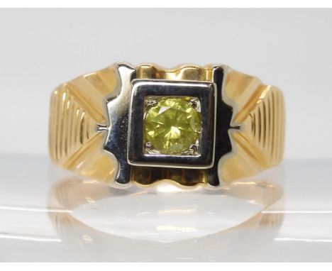 An 18k gents yellow diamond ring, set with an estimated approx 0.40ct diamond, finger size Z1/2, weight 13.8gms Ring stamped 