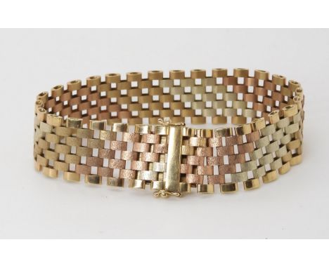 A 9ct three colour gold block link bracelet, length 17.5cm x 1.5cm, weight 21.1gms Light general wear