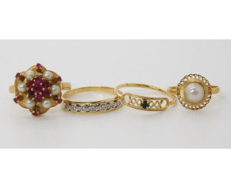 An 18ct gold diamond accent eternity ring size P1/2, an 18ct Italian blue gem set ring, size N, together with two with contin